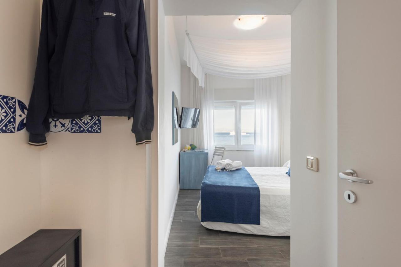 Hotel La Caletta Порто Санто Стефано Экстерьер фото