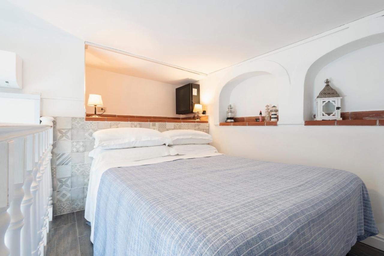 Hotel La Caletta Порто Санто Стефано Экстерьер фото