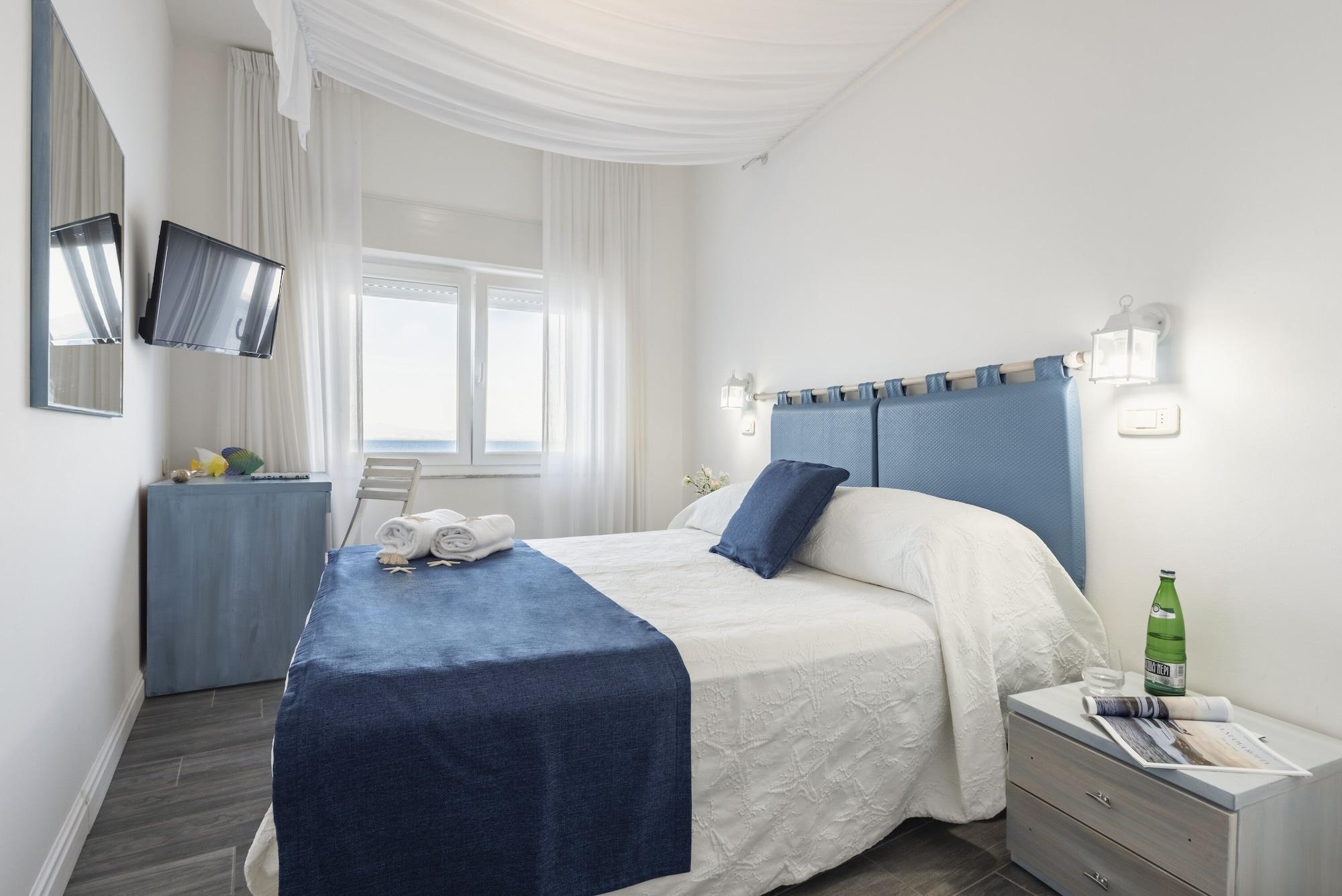 Hotel La Caletta Порто Санто Стефано Экстерьер фото