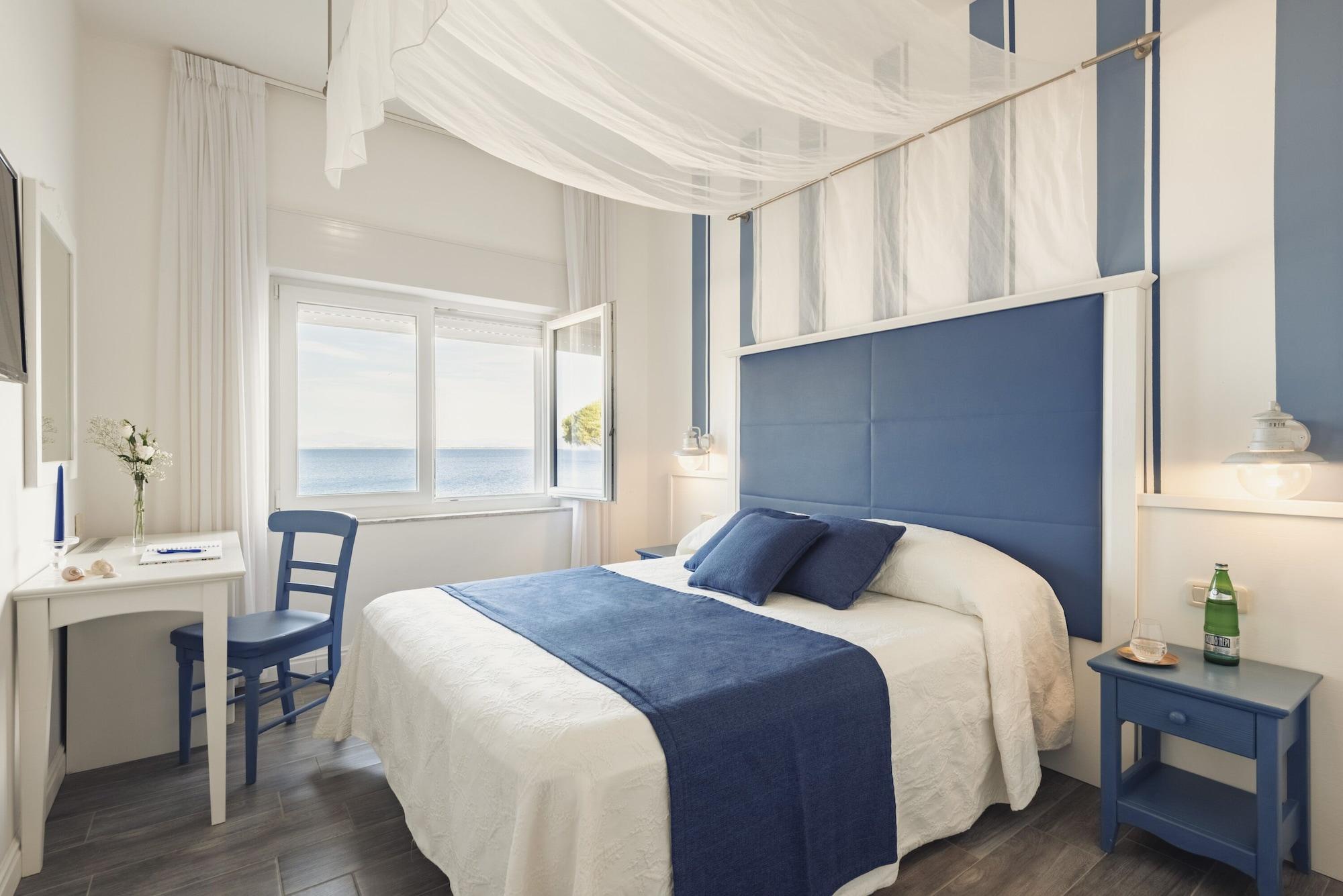 Hotel La Caletta Порто Санто Стефано Экстерьер фото