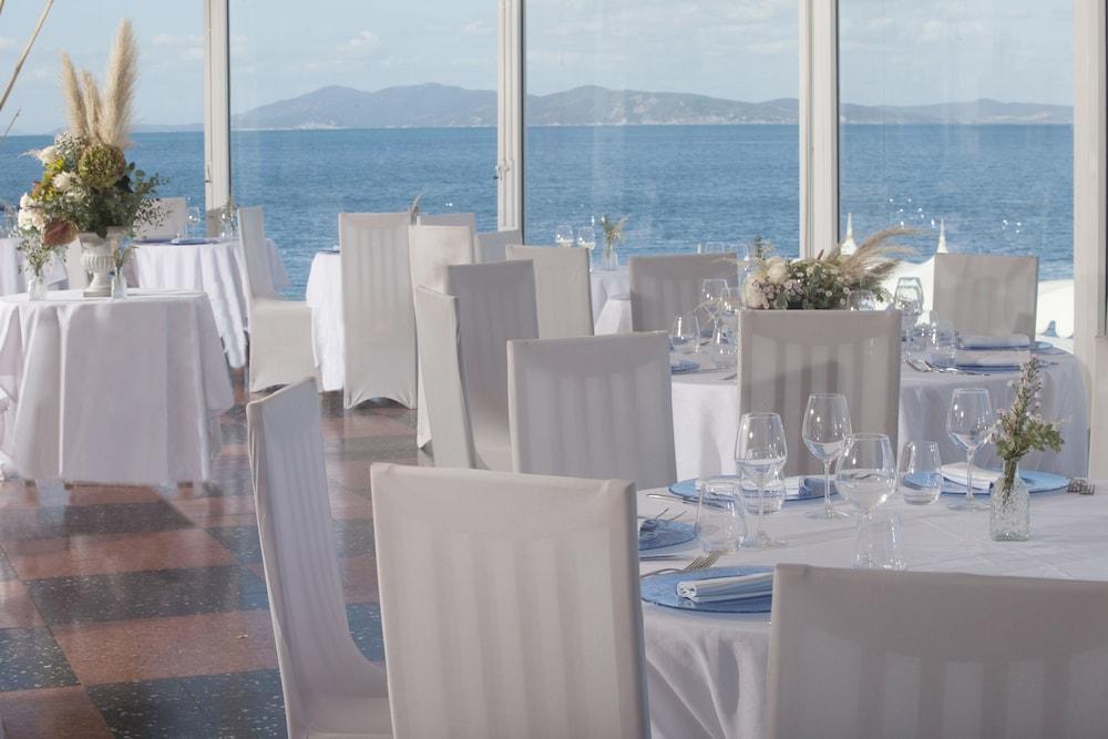 Hotel La Caletta Порто Санто Стефано Экстерьер фото