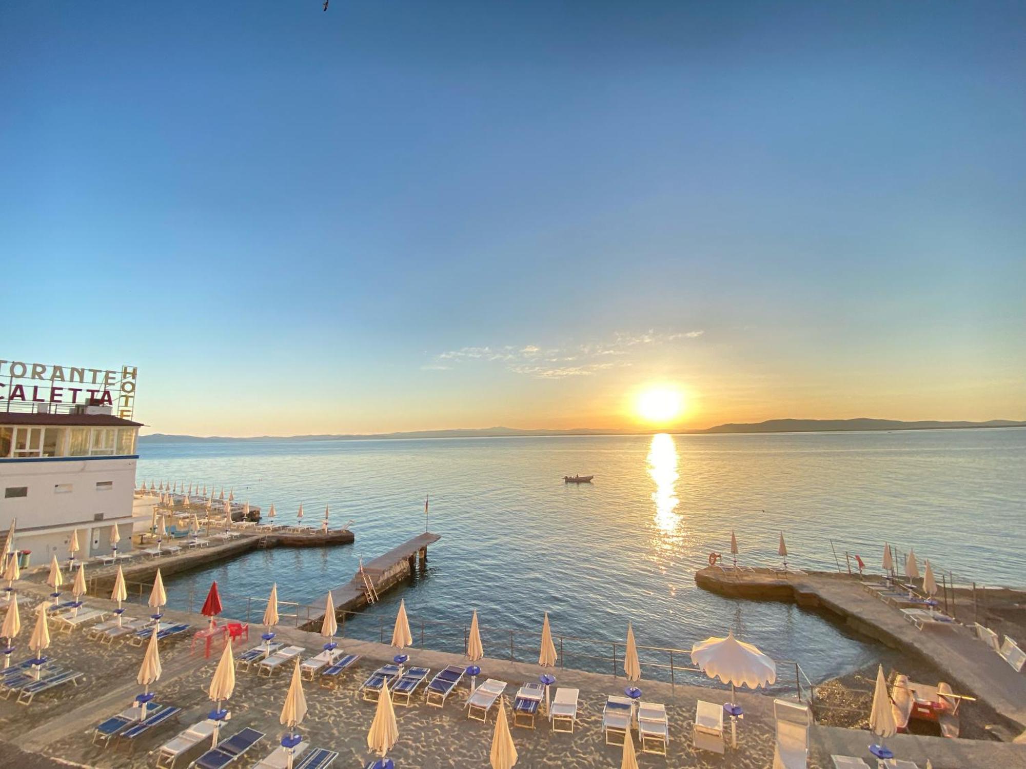Hotel La Caletta Порто Санто Стефано Экстерьер фото