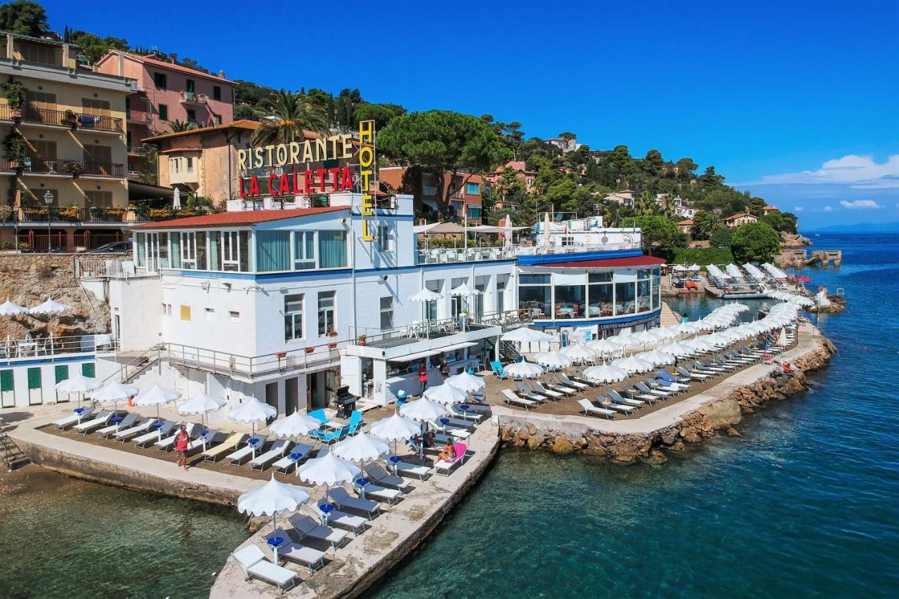 Hotel La Caletta Порто Санто Стефано Экстерьер фото