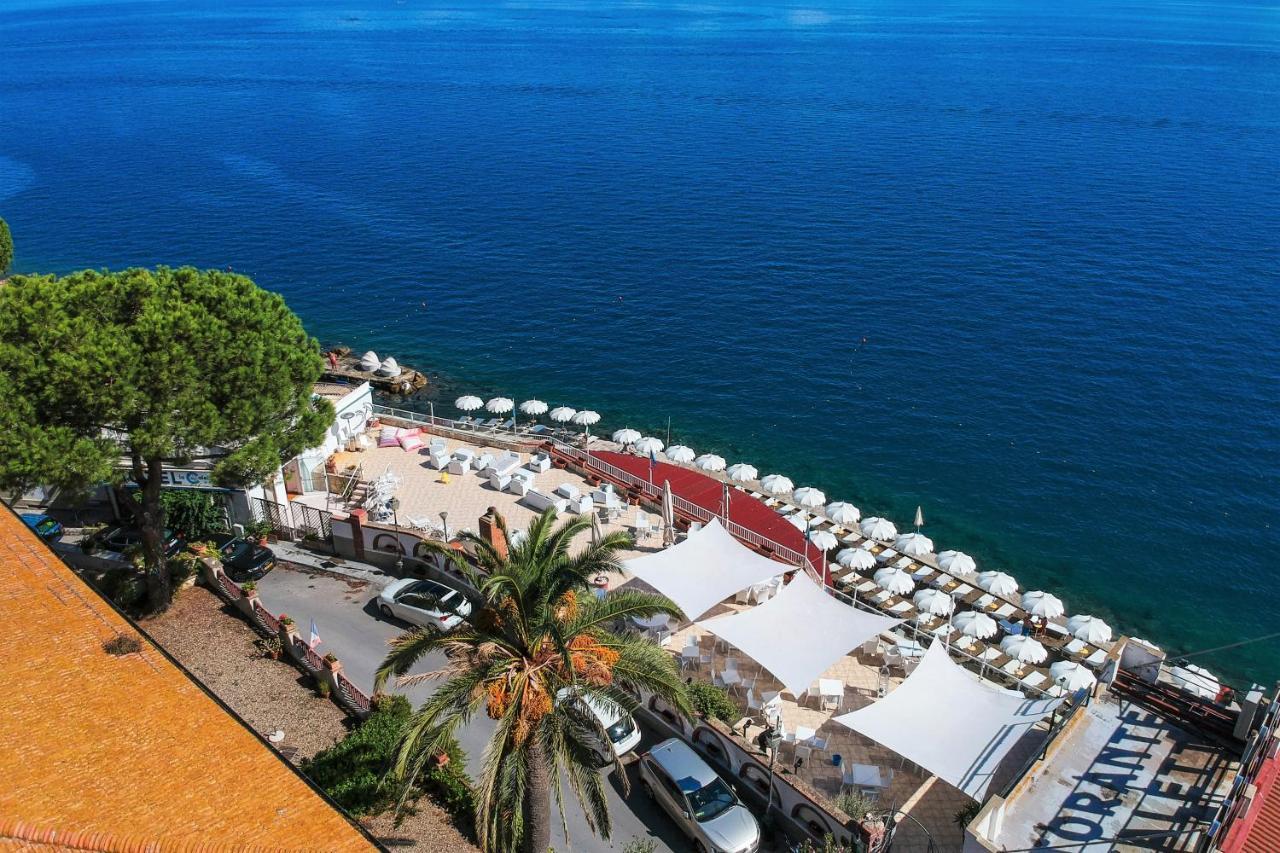 Hotel La Caletta Порто Санто Стефано Экстерьер фото