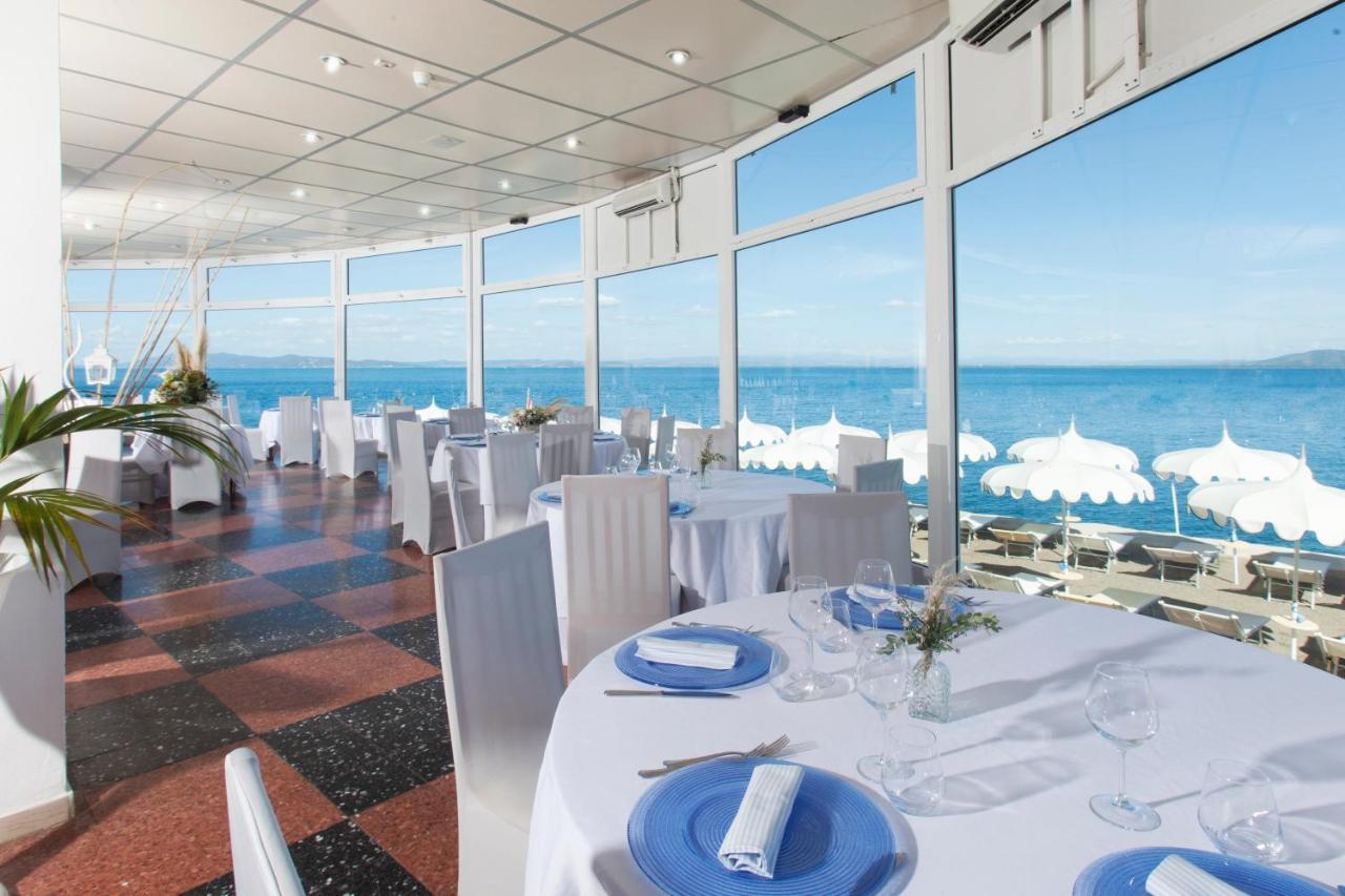 Hotel La Caletta Порто Санто Стефано Экстерьер фото
