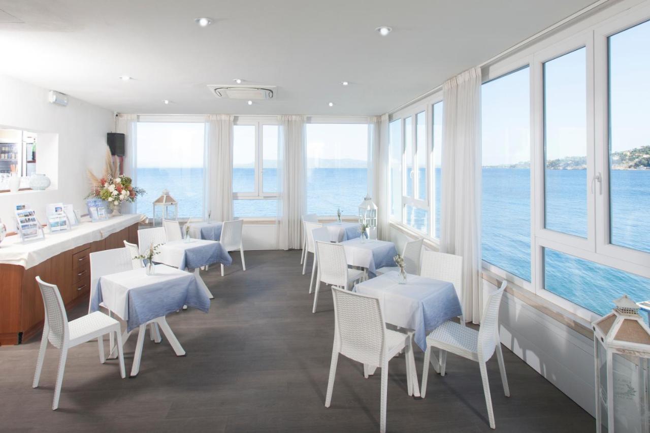 Hotel La Caletta Порто Санто Стефано Экстерьер фото