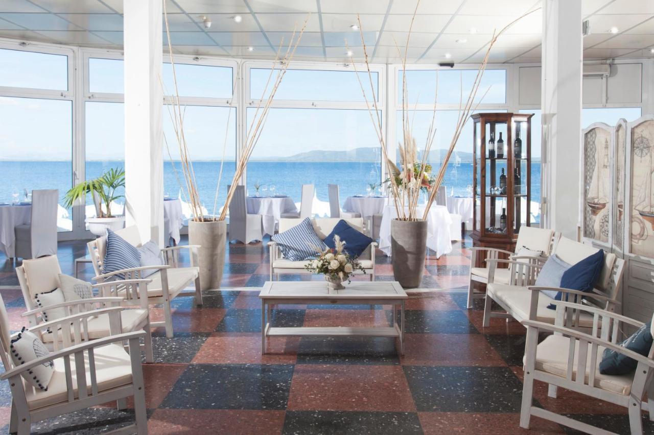 Hotel La Caletta Порто Санто Стефано Экстерьер фото