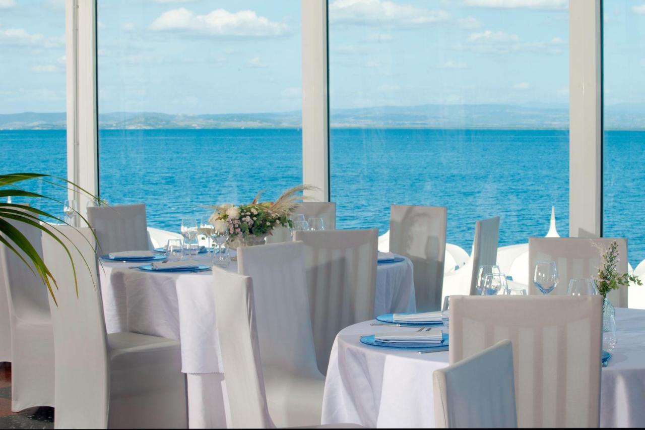Hotel La Caletta Порто Санто Стефано Экстерьер фото